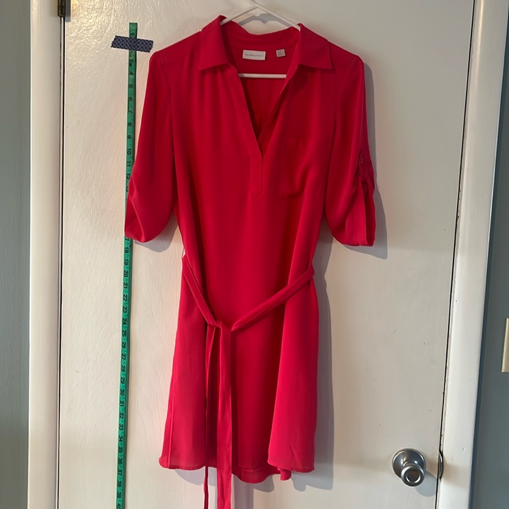 Bright pink New York and Company shirt style dress.